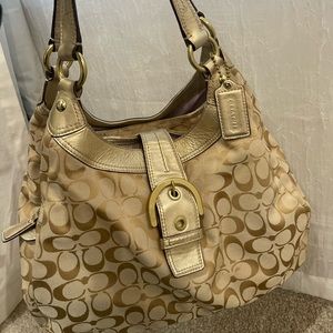 Authentic coach purse in gold/cream